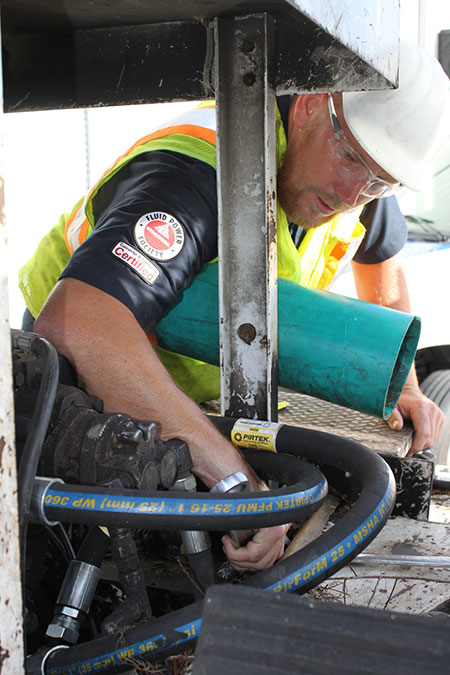 Third Place  Working Pro A safety-conscious IFPS-certified technician at work: Jeremy Durham, CFPCC, PIRTEK Space Coast MSST, connecting conductors and connectors Submitted by  Bill Turner