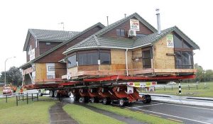 3rd Place: "Why change houses when you can move your house thanks to the power of hydraulics? My brother’s house on the move after the city decided it needed his land to make room for a motorway." - submitted by Gwyn O’Kane, CFPAI 