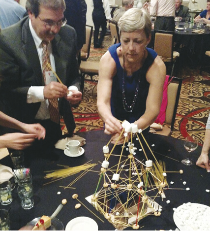 Paul Prass, Marti Wendel compete to build the tallest tower